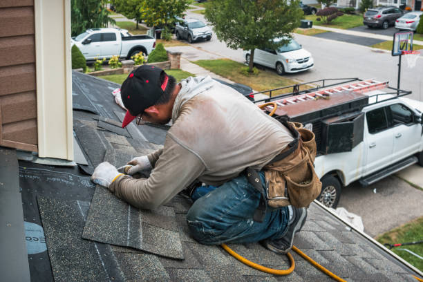 Professional Storm Damage Roof Repair technician working in Weatherly, PA